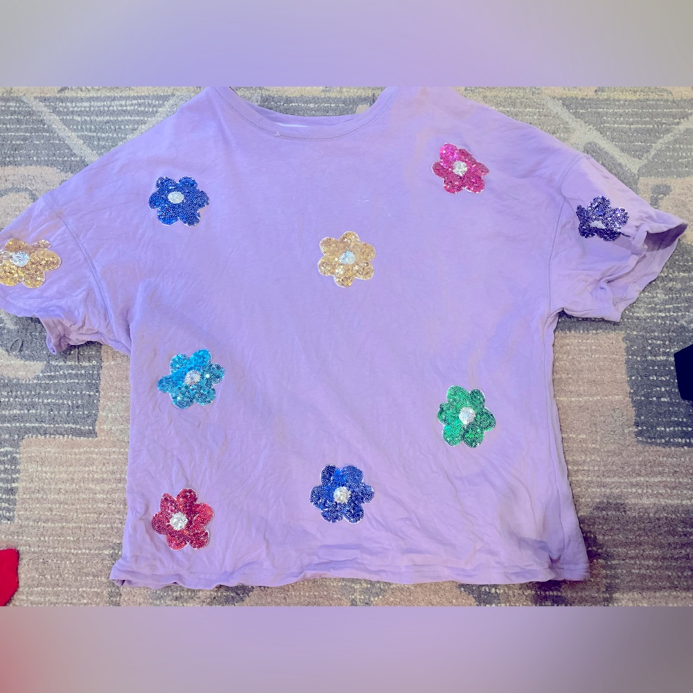 Oversized too with sequin flowers! Super cute!